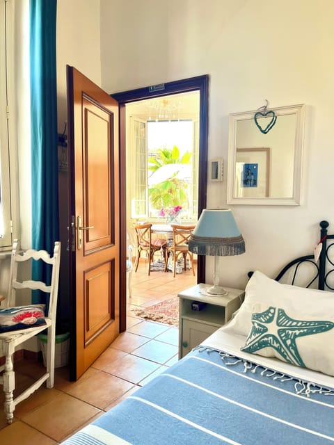 Comfort Double Room, Private Bathroom, City View | Down comforters, minibar, in-room safe, individually decorated