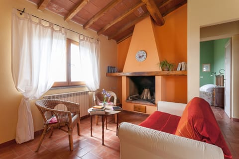 Deluxe Apartment | Living area | 22-inch TV with cable channels