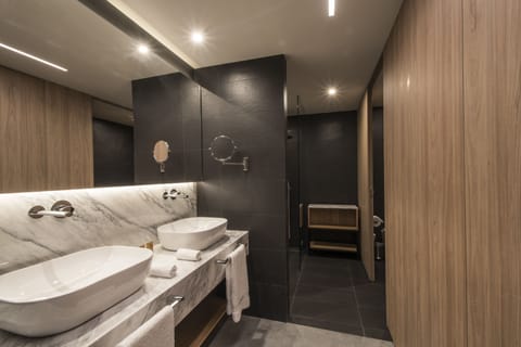 Grand Harbour Suite | Bathroom | Designer toiletries, hair dryer, bathrobes, slippers