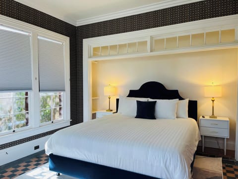 Luxury Suite | Premium bedding, down comforters, iron/ironing board, free WiFi