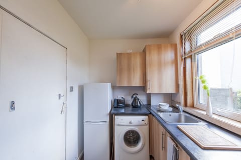 Family Apartment, 2 Bedrooms, Ground Floor | Private kitchen | Full-size fridge, microwave, oven, stovetop