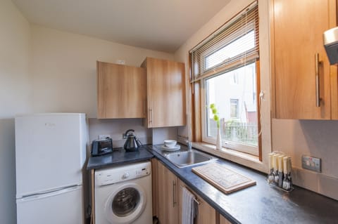 Family Apartment, 2 Bedrooms, Ground Floor | Private kitchen | Full-size fridge, microwave, oven, stovetop