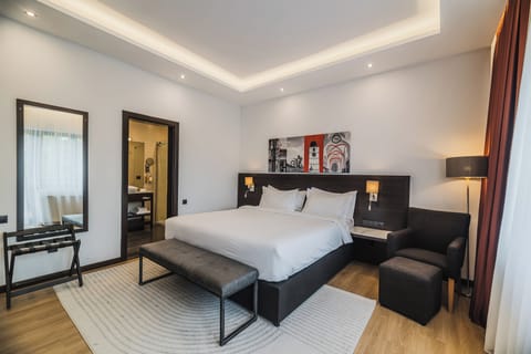 Superior Double Room, Balcony | Minibar, in-room safe, desk, blackout drapes