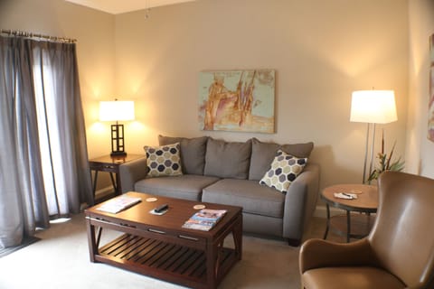 Standard Bungalow | Living area | 40-inch flat-screen TV with satellite channels, fireplace