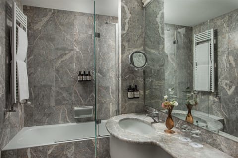 Eco-friendly toiletries, hair dryer, bidet, towels