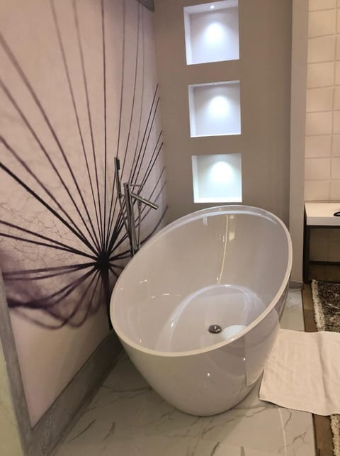 Shower, free toiletries, hair dryer, bathrobes