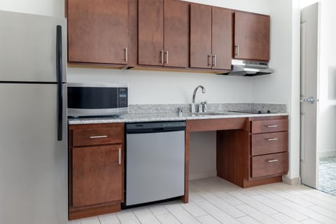 Suite, 1 King Bed, Accessible, Bathtub | Private kitchen | Full-size fridge, microwave, dishwasher, coffee/tea maker