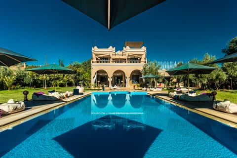 Outdoor pool, open 9:00 AM to 8:00 PM, pool umbrellas, sun loungers