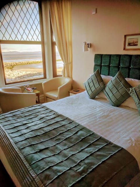 Queen Room with Sea View - First Floor | Individually decorated, individually furnished, desk, blackout drapes