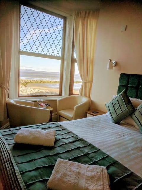 Queen Room with Sea View - First Floor | Individually decorated, individually furnished, desk, blackout drapes
