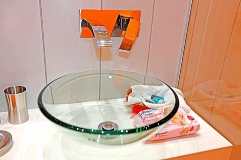 Suite, 2 Bedrooms | Bathroom | Shower, free toiletries, hair dryer, slippers