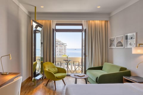 Premium Triple Room, Sea View | Premium bedding, minibar, in-room safe, desk