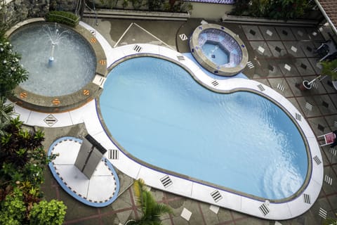 Outdoor pool, open 9:00 AM to 9:00 PM, sun loungers