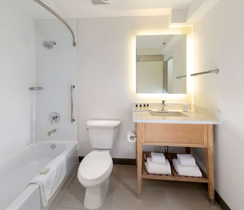 Suite, 1 King Bed, Non Smoking (Deans) | Bathroom | Combined shower/tub, designer toiletries, hair dryer, towels