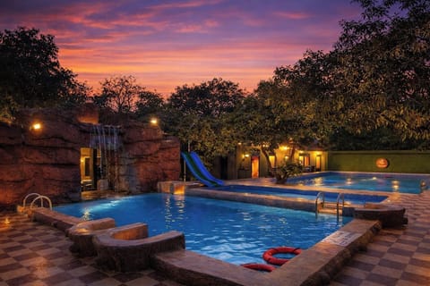 Outdoor pool, pool umbrellas, sun loungers
