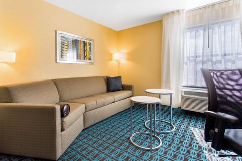 Suite, 1 King Bed with Sofa bed | Living room | 40-inch LCD TV with satellite channels, TV