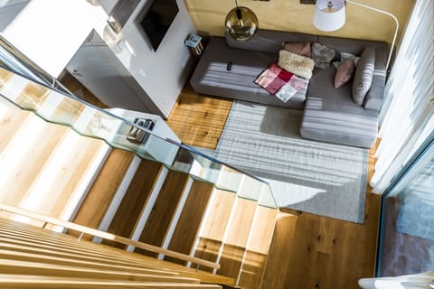 Exclusive Chalet, 2 Bedrooms | Living area | Flat-screen TV, fireplace