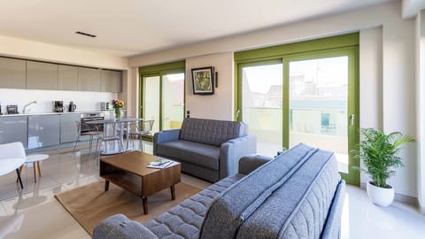 2-Bedroom Apartment | Living area | 43-inch plasma TV with satellite channels, TV