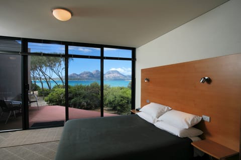 Ocean View Studio | Desk, blackout drapes, soundproofing, iron/ironing board