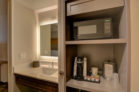 Down comforters, pillowtop beds, desk, blackout drapes