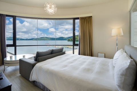 Luxury Quadruple Room, Lake View | Down comforters, desk, blackout drapes, soundproofing