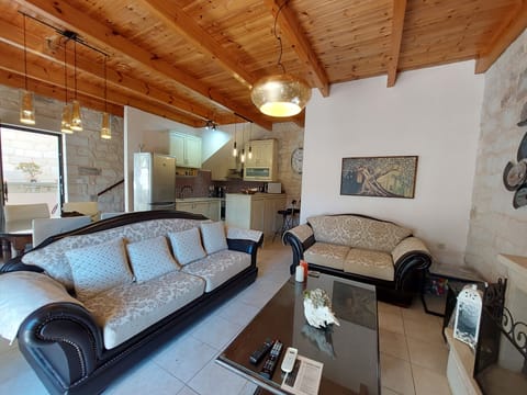 Superior Villa, 2 Bedrooms, Private Pool (Christy) | Living area | 42-inch flat-screen TV with satellite channels, Smart TV, fireplace