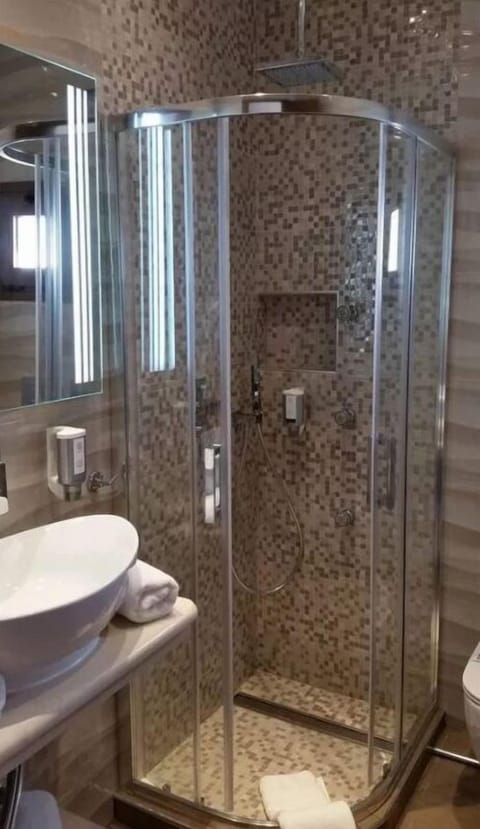 Panoramic Double Room (Olympus View) | Bathroom | Designer toiletries, hair dryer, slippers, towels