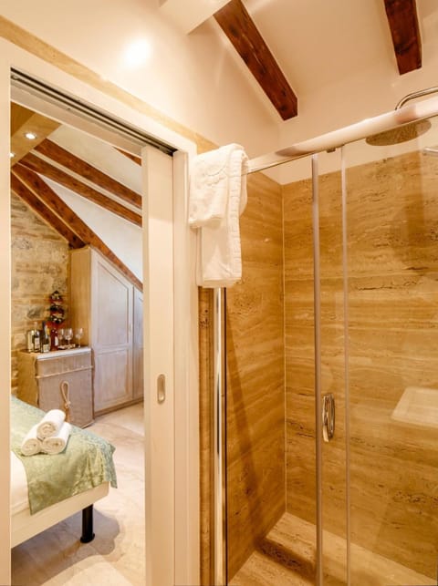 Shower, free toiletries, hair dryer, slippers