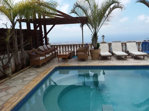 Outdoor pool, pool umbrellas, sun loungers