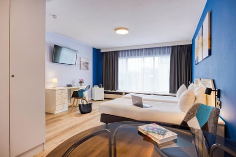 Chambre Standard Twin (EU Area View) | Individually decorated, desk, laptop workspace, blackout drapes