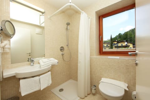 Shower, free toiletries, hair dryer, towels