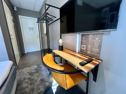 Desk, blackout drapes, soundproofing, free WiFi