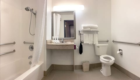 Desk, laptop workspace, blackout drapes, iron/ironing board