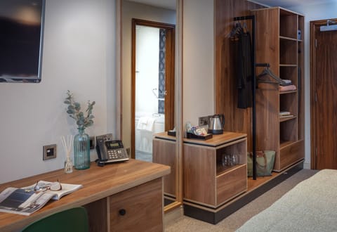 Hypo-allergenic bedding, in-room safe, desk, laptop workspace