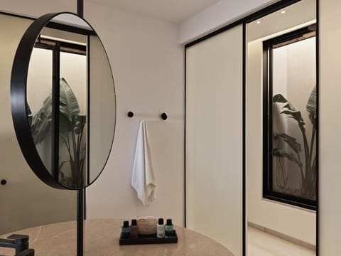 Hideaway Pool Villa | Bathroom | Rainfall showerhead, designer toiletries, hair dryer, bathrobes
