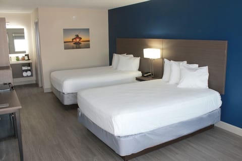 Premium bedding, pillowtop beds, desk, blackout drapes