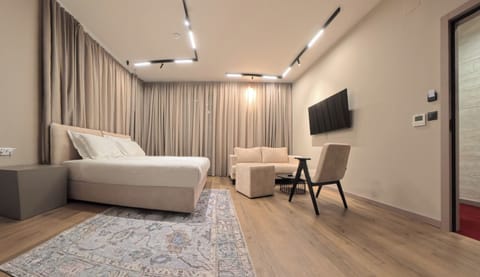 Premium bedding, down comforters, minibar, in-room safe