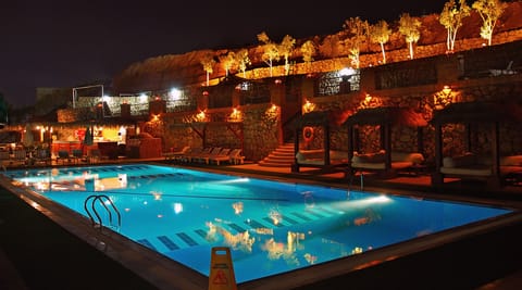 Outdoor pool, pool umbrellas, sun loungers