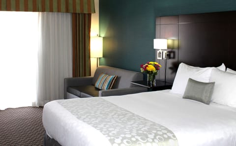 Desk, laptop workspace, blackout drapes, iron/ironing board