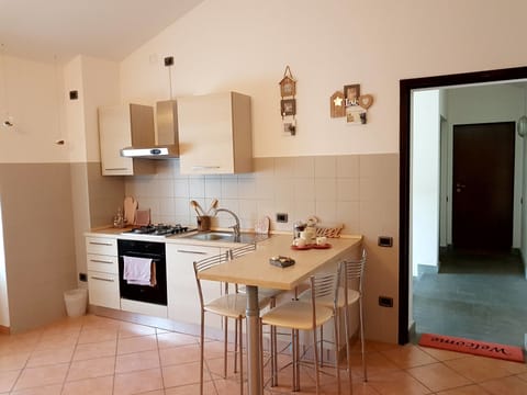 Apartment, 1 Bedroom | Private kitchenette | Full-size fridge, microwave, oven, stovetop