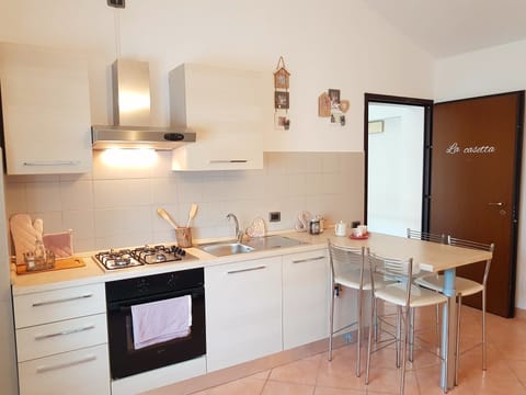 Apartment, 1 Bedroom | Private kitchenette | Full-size fridge, microwave, oven, stovetop