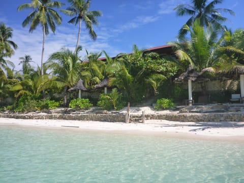 Private beach, white sand, free beach cabanas, sun loungers