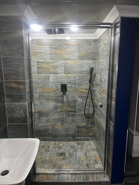 Exclusive Studio, 1 Bedroom, Patio, Garden View | Bathroom | Shower, rainfall showerhead, hair dryer, towels