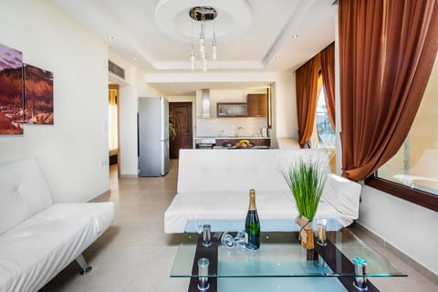 Family Suite 2-Bedroom Sea View | Living area | LCD TV
