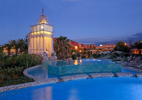 2 outdoor pools, open 10:30 AM to 6:30 PM, pool umbrellas, sun loungers