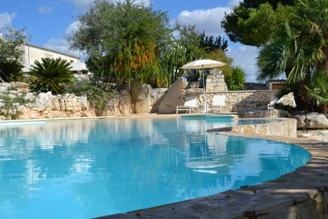 Seasonal outdoor pool, pool umbrellas, sun loungers
