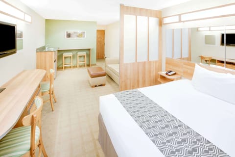 Premium bedding, pillowtop beds, desk, blackout drapes