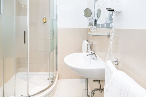 Shower, eco-friendly toiletries, hair dryer, towels