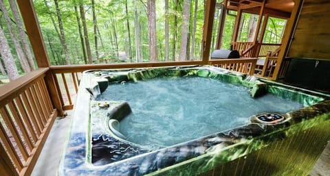 Cabin, 2 Bedrooms | Outdoor spa tub
