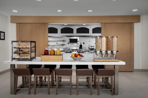 Daily buffet breakfast (USD 15 per person)